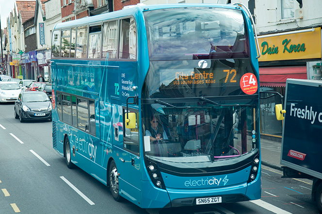 Electric Bus traveling down Gloucester Road, Bristol