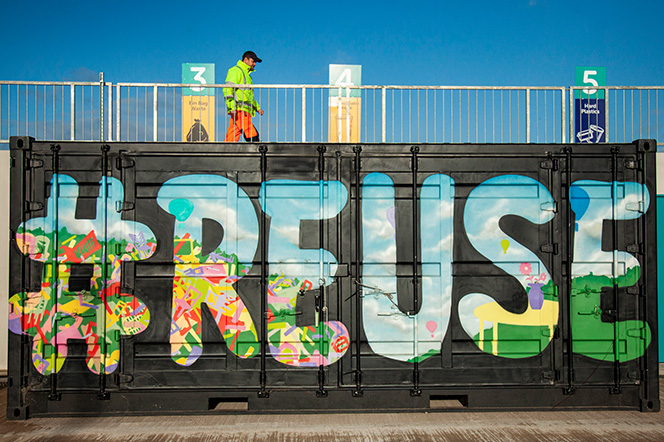 Bristol Waste Site Avonmouth colourful graffiti mural '#REUSE'.