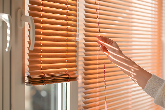 Home blinds being adjusted